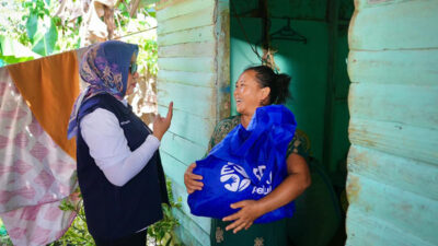 BRI Peduli, Bagikan 700 Paket Sembako Bagi Warga Sri Meranti Rumbai